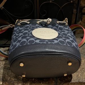 Coach Dempsey drawstring crossbody